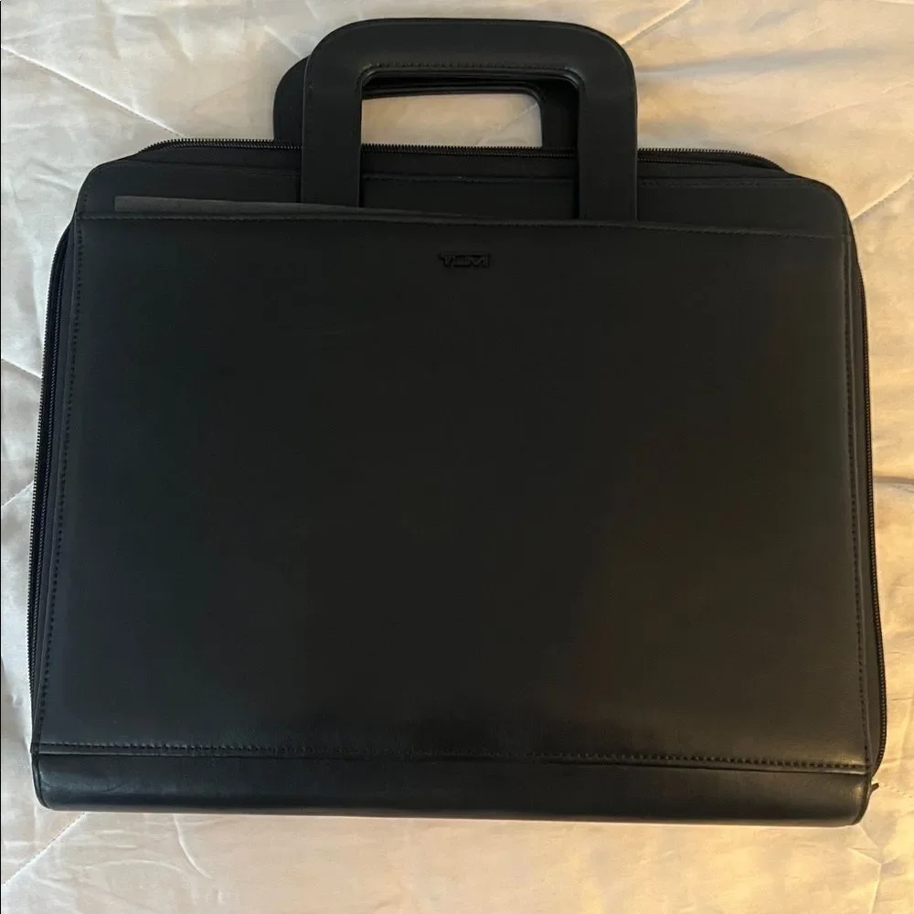 Tumi executive black leather portfolio case with pull out handles